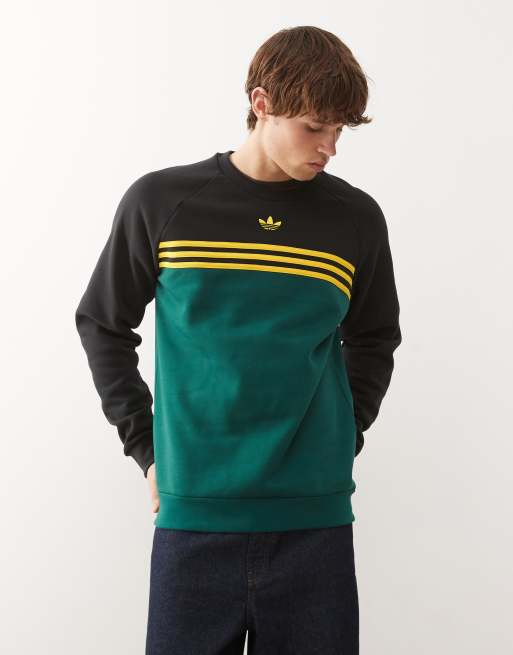 Sudadera verde universitario y negra con cuello redondo y detalle de rayas en el pecho de adidas Originals