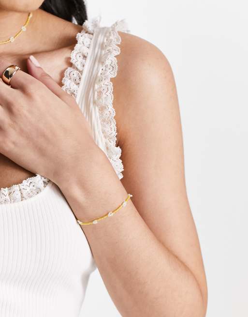 SUI AVA daisy charm festival beaded bracelet in yellow