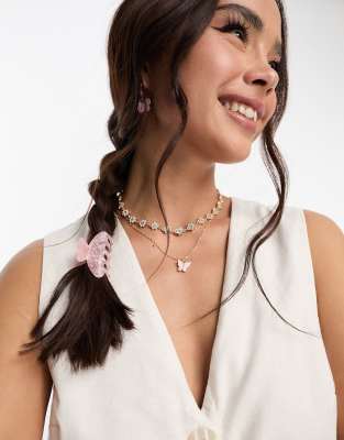 SUI AVA helle treasure mini pearl hair claw clip in pink - ASOS Price Checker