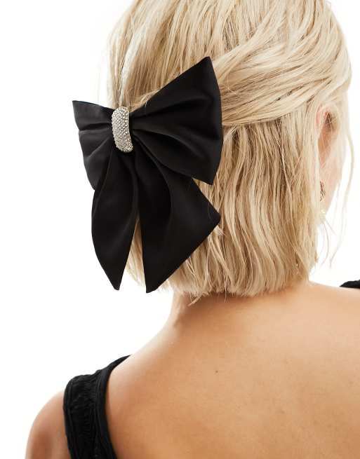 SUI AVA - Moondust - Fermaglio per capelli nero a forma di fiocco con decorazione argento