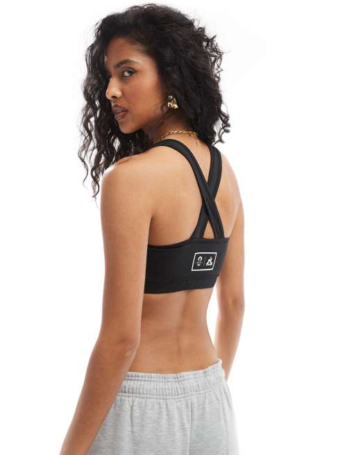 Sujetador deportivo negro con diseno para los Juegos Olimpicos de Paris 2024 de Le Coq Sportif