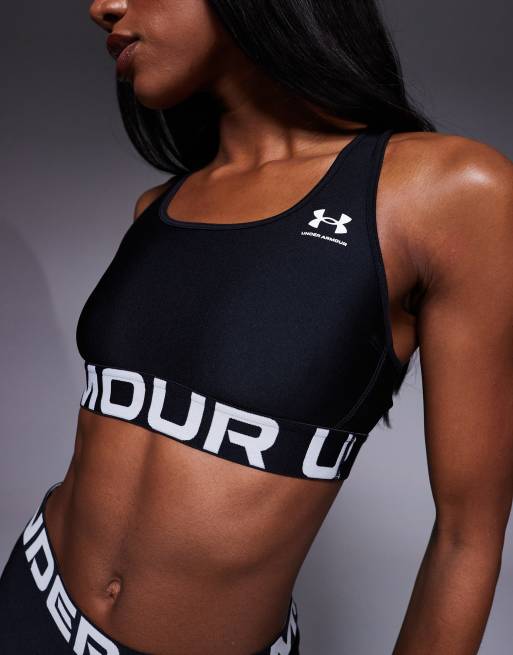 Sujetador deportivo negro con logo Heatgear Mid de Under Armour , 3 de 4