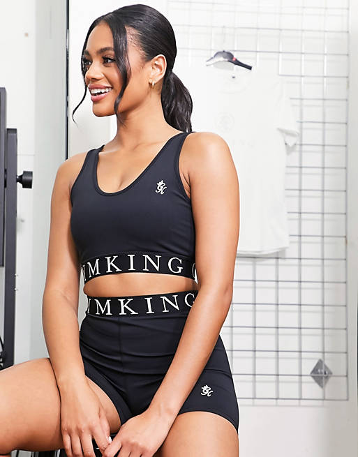 Mujer Sujetadores deportivos | Sujetador deportivo negro de sujeción media con cinta del logo Impact de Gym King - VL18474