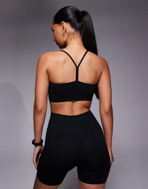 Sujetador deportivo negro sin costuras Dri-FIT de Nike Pro Training, 3 de 4