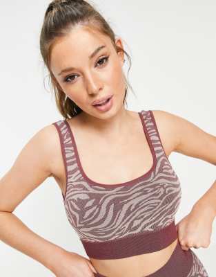 Sujetador deportivo rosa negruzco de sujeción ligera sin costuras con estampado animal de South Beach
