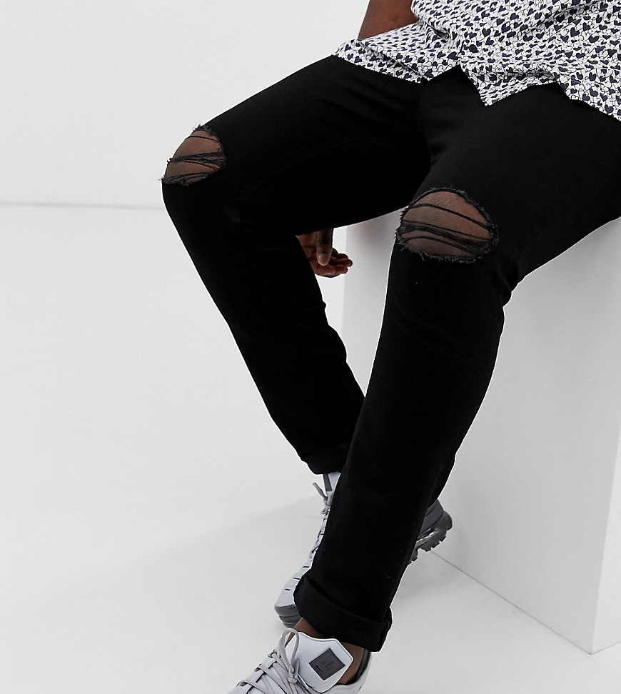 Super-skinny jeans med flænger på knæene, Plus Size, fra ASOS DESIGN-Sort