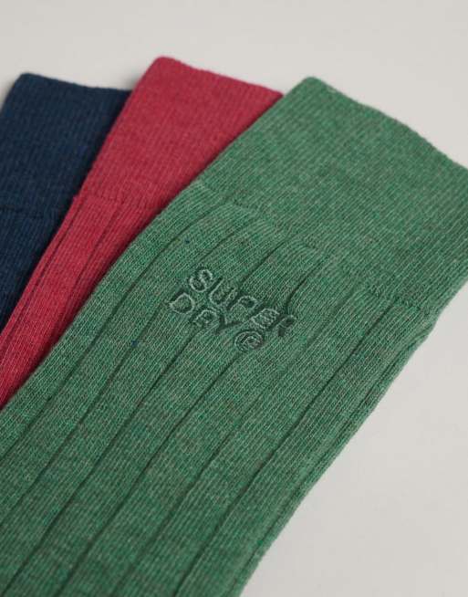 Superdry – 3er-Pack gerippte Unisex-Crew-Socken aus Baumwolle in meliertem Kirschrot mit Markenlogo