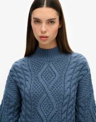 Superdry - Aran - Polopullover in Vintage-Denim-Blau aus Zopfstrick