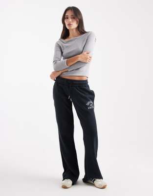 Superdry - Athletic - Ausgestellte Jogginghose in Eclipse Navy mit Print-Marineblau