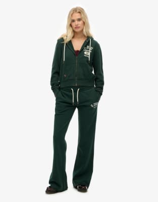 Superdry - Athletic - Ausgestellte Jogginghose in Emaille-Grün mit Stickerei