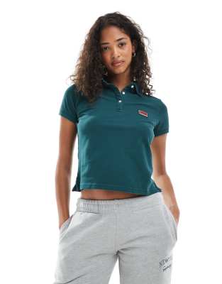 Superdry Athletic essentials graphic polo shirt in dark pine green - view 1