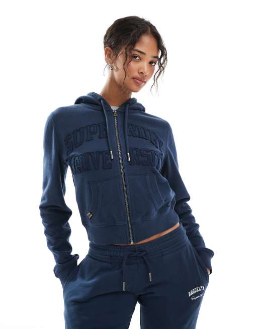 Superdry - Athletic Essentials - Sweat à capuche court avec fermeture éclair et détail ton sur ton - Bleu marine