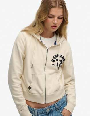 Superdry - Athletic - Locker geschnittene Cropped-Kapuzenjacke in Turtledove-Cremeweiß mit Reißverschluss