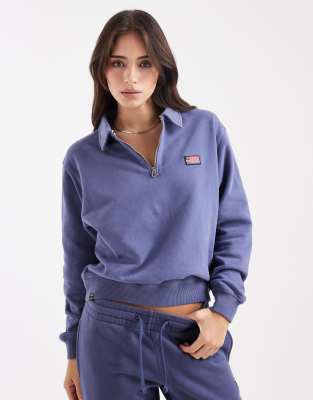 Superdry - Athletic - Pullover in Marineblau mit Kragen und kurzem Reißverschluss