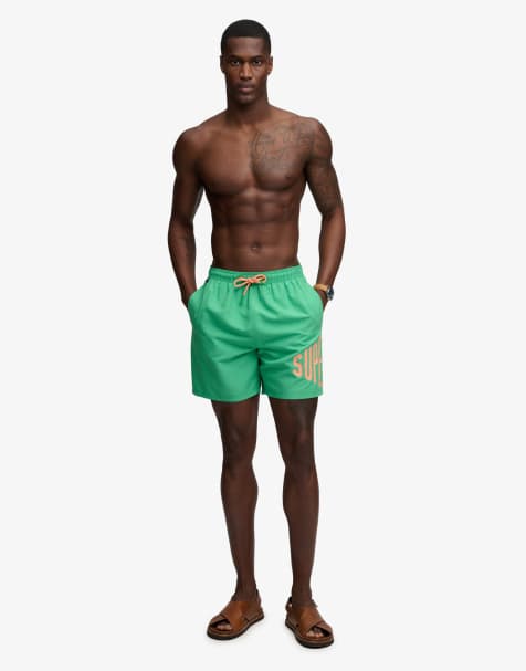 Superdry – Badeshorts in Kelly-Grün mit Logoprint, 16 Zoll Schrittlänge - view 1