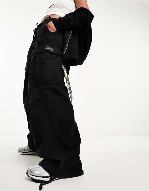Superdry baggy parachute trousers in black - view 1