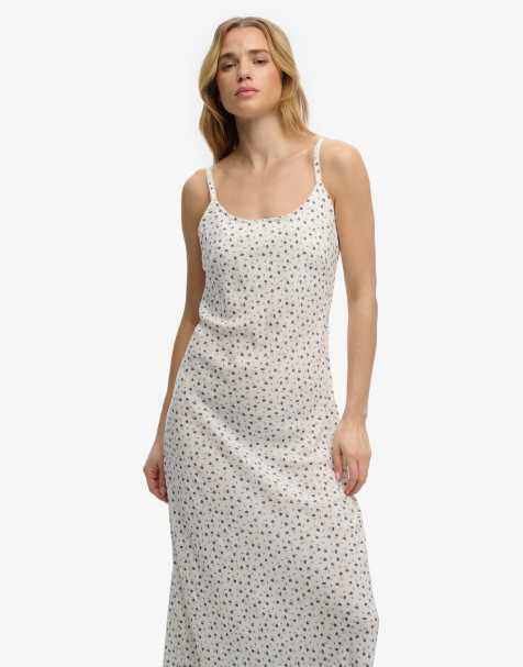 Superdry – Camisole-Maxikleid in gebrochenem Weiß mit Blümchenmuster - view 1