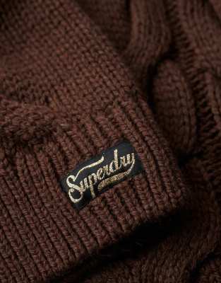 Superdry - Chain - Polopullover in der Farbe Braun Chicory Coffee Twist mit Zopfstrickmuster