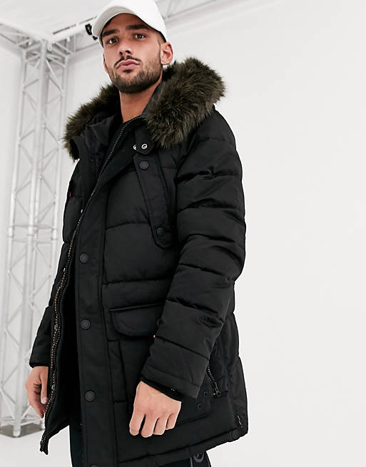Superdry Chinook hooded parka jacket with faux fur trim in black | ASOS