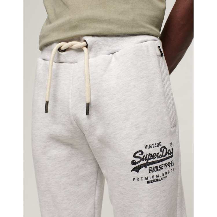 Superdry VINTAGE LOGO FLARE JOGGERS - Tracksuit bottoms - ice marl