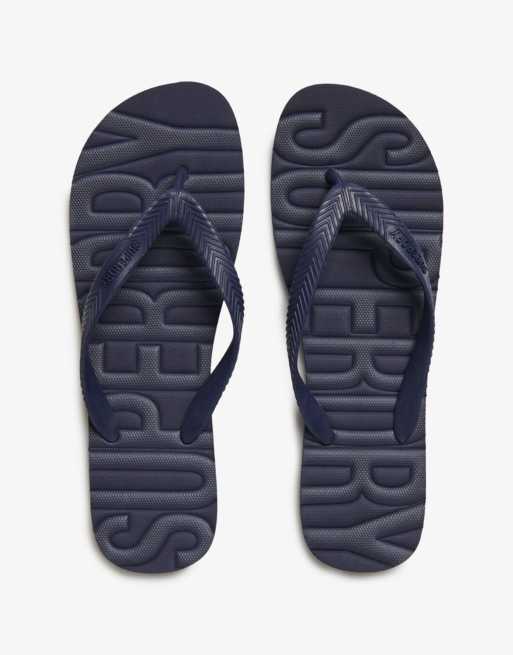 Superdry Core – Zehenstegsandalen in kräftigem, farblich abgestimmtem Marineblau mit Logo
