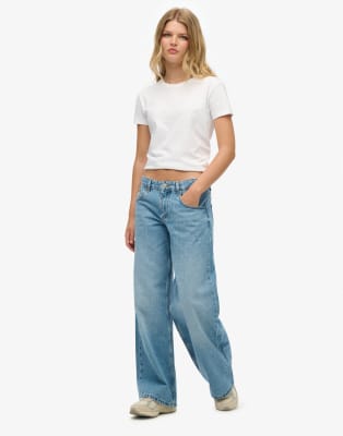 Superdry - Cult - Weite Jeans in hellblauer Vintage-Waschung mit mittelhohem Bund