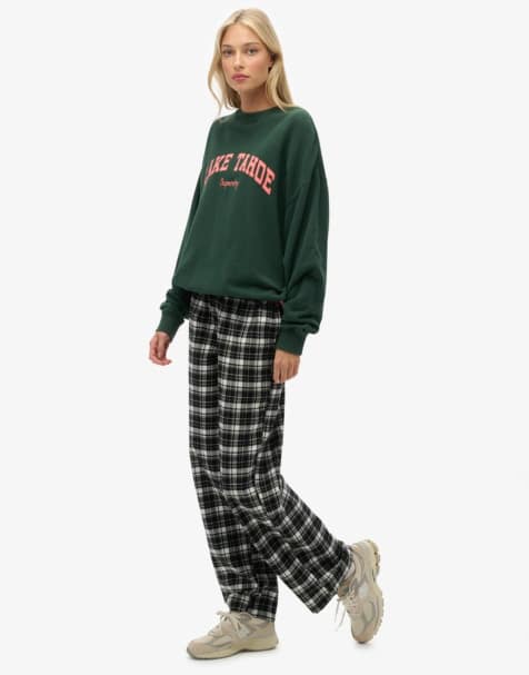 Superdry – Elastische Hose aus Baumwolle in Schwarz/Ecru kariert - view 1