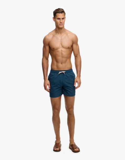 Superdry Embroidered logo 15- inch swim shorts in blue bottle - view 1