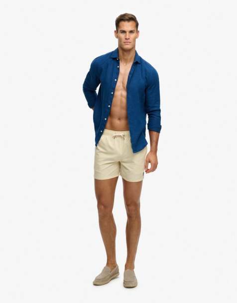 Superdry Embroidered logo 15- inch swim shorts in pastel yellow