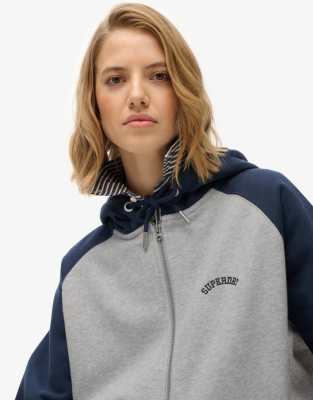 Superdry - Essential - Kapuzenpullover in gletschergrau meliert/sattem Marineblau mit Logo, Raglanärmeln und Reißverschl...