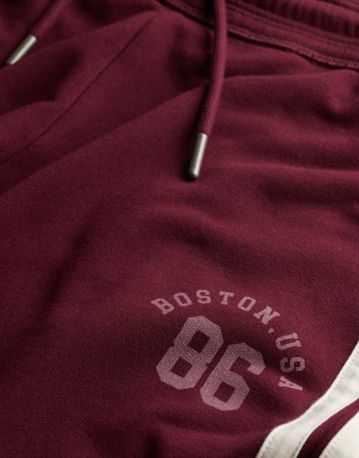 Superdry Jogginghose mit Streifen und ausgestelltem Bein in Portrot, 5 von 6
