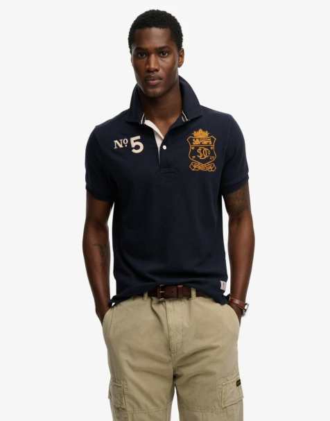 Superdry – Kurzärmliges Rugby-Poloshirt aus Jersey in Eclipse-Marineblau mit doppeltem Emblem - view 1