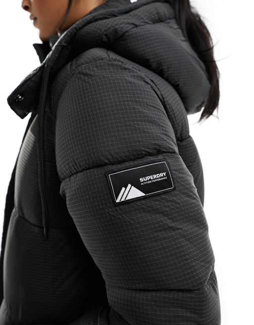 Superdry – Lang geschnittene Ripstop-Steppjacke in Schwarz ASOS