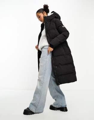 Superdry - Lang geschnittene Steppjacke in Schwarz mit Kapuze