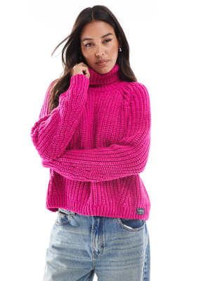 Superdry - Lockerer, gestrickter Rollkragenpullover in Magentarosa mit Maschenstruktur