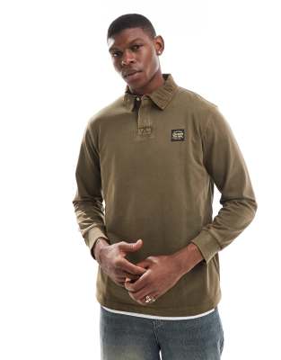 Superdry Long sleeved contrast stitch rugby shirt in washed beach dark green