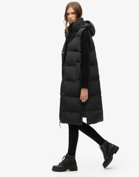 Superdry – Longline-Pufferweste in Schwarz mit Kapuze - view 1