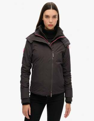 Superdry - Pop Arctic SD-Windcheater - Jacke in dunklem Anthrazit/blassem fluoreszierendem Rosa mit Reißverschluss und K...