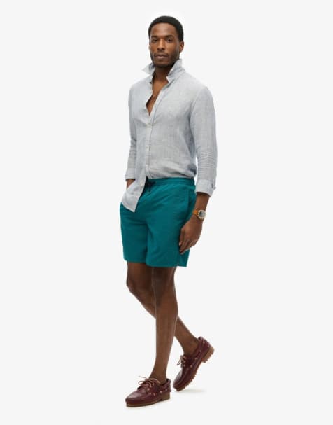 Superdry Premium embroidered 17-inch swim shorts in forest green - view 1