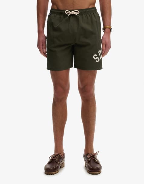 Superdry Printed logo 16-inch swim shorts in surplus goods olive green - view 1
