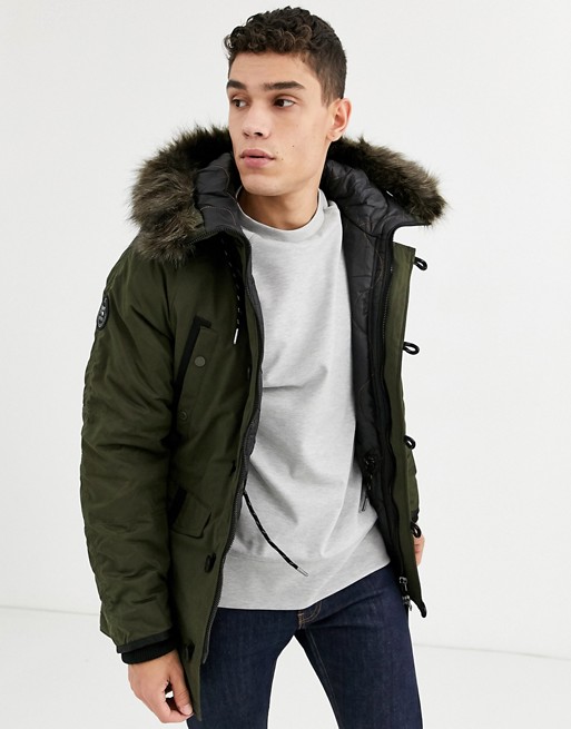 Superdry SDX hooded parka jacket with faux fur trim in khaki