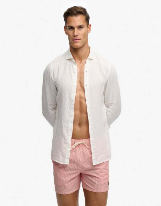 Superdry Seer sucker 15-inch swim shorts in sugar coral/white thin stripe, 7 of 7