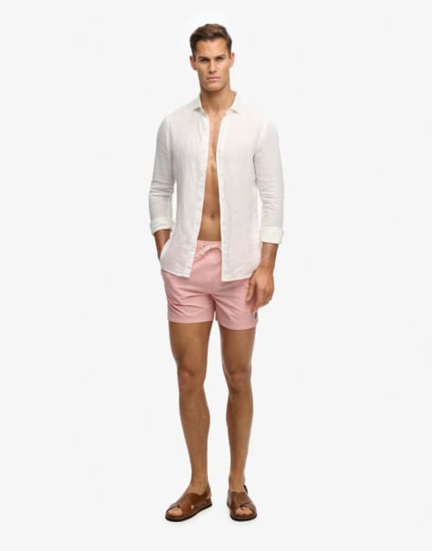 Superdry – Seersucker-Badeshorts in Zuckerkoralle mit zarten weißen Streifen, 15 Zoll Schrittlänge - view 1