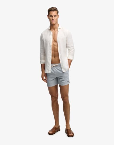 Superdry - Short de bain 15 pouces en crépon à rayures - Blanc riz/bleu ciel - view 1