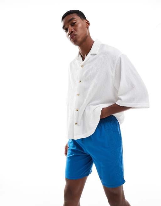 Superdry - Short de bain 17 pouces de qualité supérieure à broderie - Bleu crépuscule