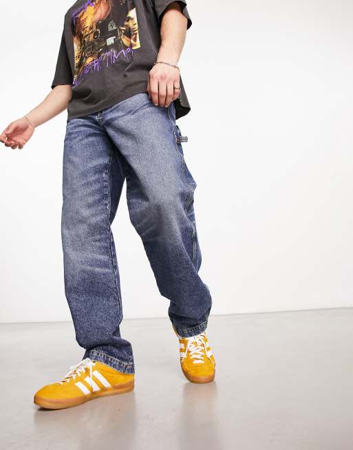 Superdry – Snickarjeans i mörk tvätt och vintagestil