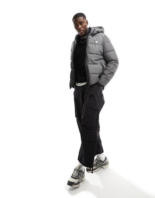 Superdry – Sportliche Steppjacke in dunklem Schiefergrau mit Kapuze