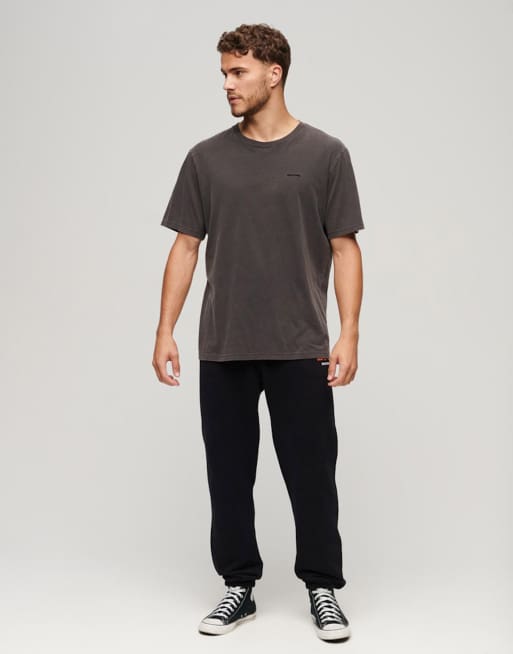 Superdry – Sportswear – Schmal zulaufende Jogginghose in Schwarz mit Logo