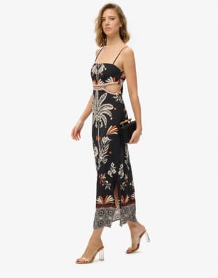 Superdry - Statement - Maxikleid in Schwarz mit Cut-out und Dschungelmuster