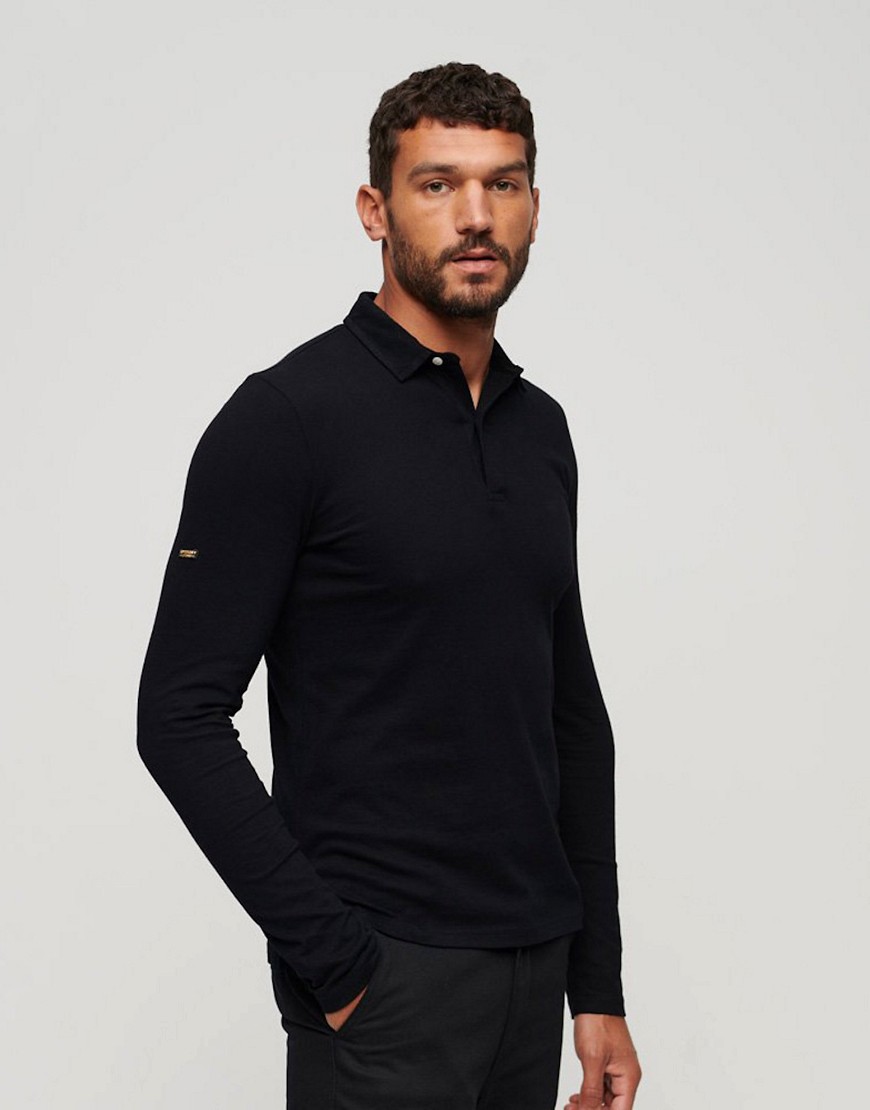 Superdry Studios long sleeve jersey polo shirt in black